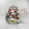 Chinese cockerel and cat teapot, c. 1740, Qianlong Period. Handle