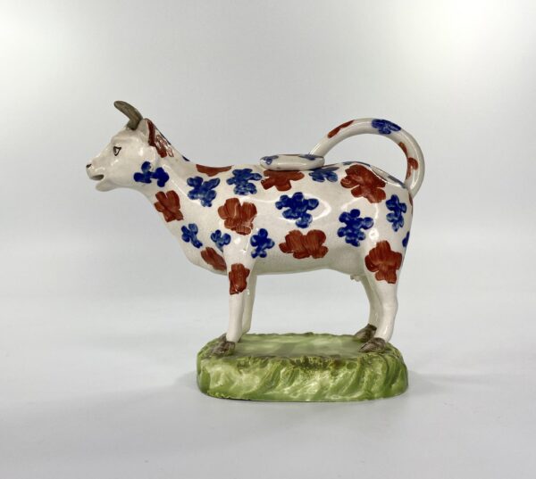 21F897E7-1248-4A2D-BD56-28063907E98C Swansea pottery cow creamer, c. 1820.
