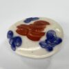 9FBF84D2-6332-417A-8688-26BC5E8D07AA Swansea pottery cow creamer, c. 1820.