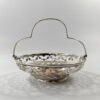E0888A47-C9C7-4F26-B8CF-E89B6015098E Royal Worcester silver mounted basket, painted by Ricketts, dated 1912. side