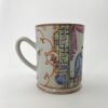 23166B6A-9734-48B5-B35B-3351E9F6119E Chinese porcelain mug. Famille rose decoration. c. 1760. detailing