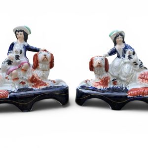 Staffordshire figures of Royal Children upon Irish Setters, c. 1850.
