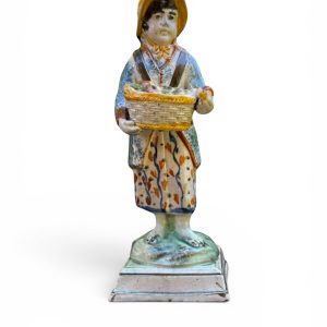 Prattware pottery figure Fruit Seller, Staffordshire, c. 1820.